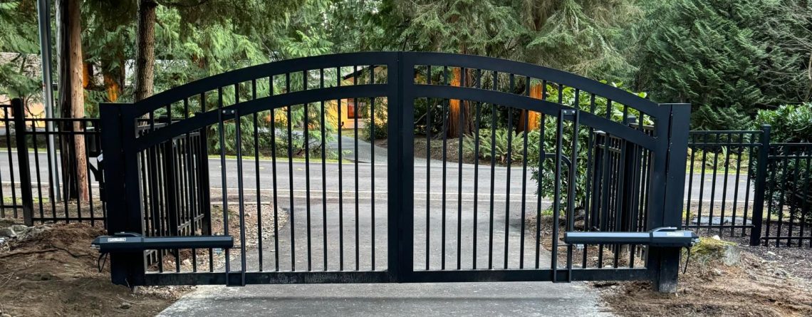Black arched automated gate installed in Bellevue by Fences & Gates Pro and Custom Railings WA