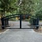 Black arched automated gate installed in Bellevue by Fences & Gates Pro and Custom Railings WA