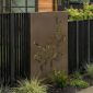 Laser-cut metal designer fence in Seattle, WA with corten steel decorative panels and vertical steel slats